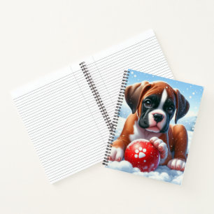 Boxer Puppy Playing With a Red Ball in a Winter Notebook