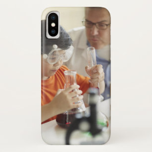 Boy (6-7) and teacher in chemistry class iPhone XS case