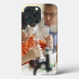 Boy (6-7) and teacher in chemistry class iPhone 13 pro case