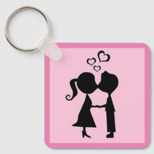 BOY AND GIRL GIVING EACH OTHER A VALENTINE KISS KEY RING
