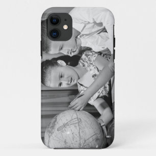 Boy and Girl Viewing Globe iPhone 11 Case