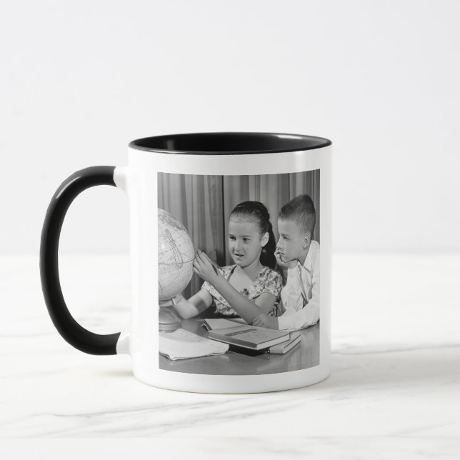 Boy and Girl Viewing Globe Mug (Left)