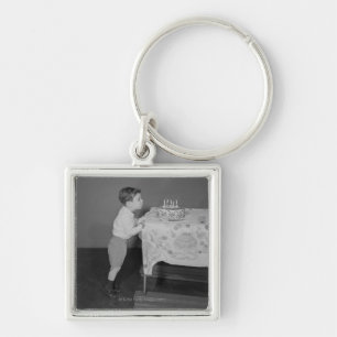 Boy Blowing Out Candles Key Ring