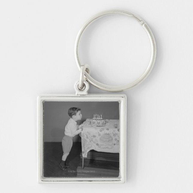 Boy Blowing Out Candles Key Ring (Front)