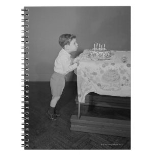 Boy Blowing Out Candles Notebook