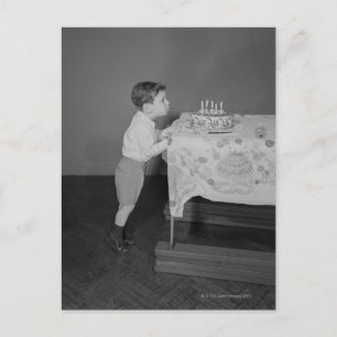 Boy Blowing Out Candles Postcard