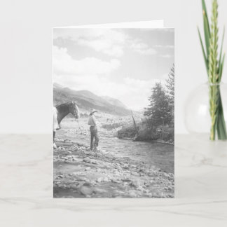 Boy fly fishing in a creek card