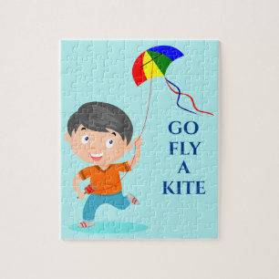 Boy flying kite puzzle. jigsaw puzzle