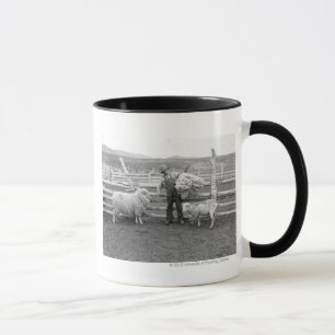 Boy holding up a bundle of wool mug