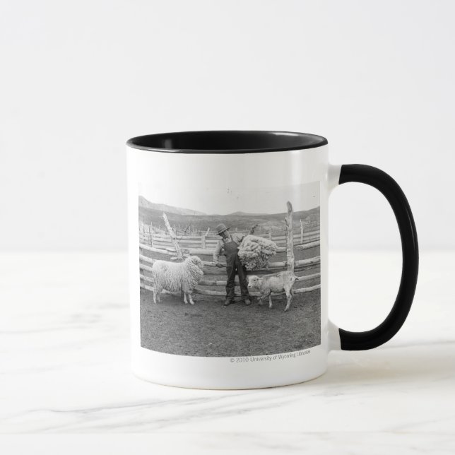 Boy holding up a bundle of wool mug (Right)
