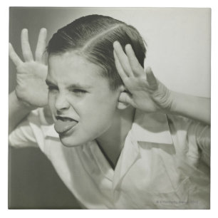 Boy Making Face Ceramic Tile