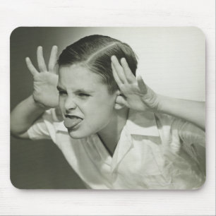 Boy Making Face Mouse Pad