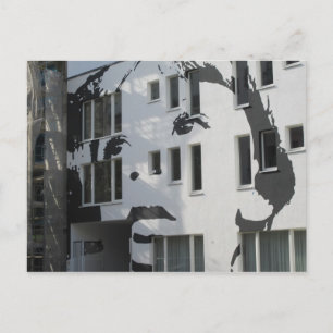 boy on wall postcard