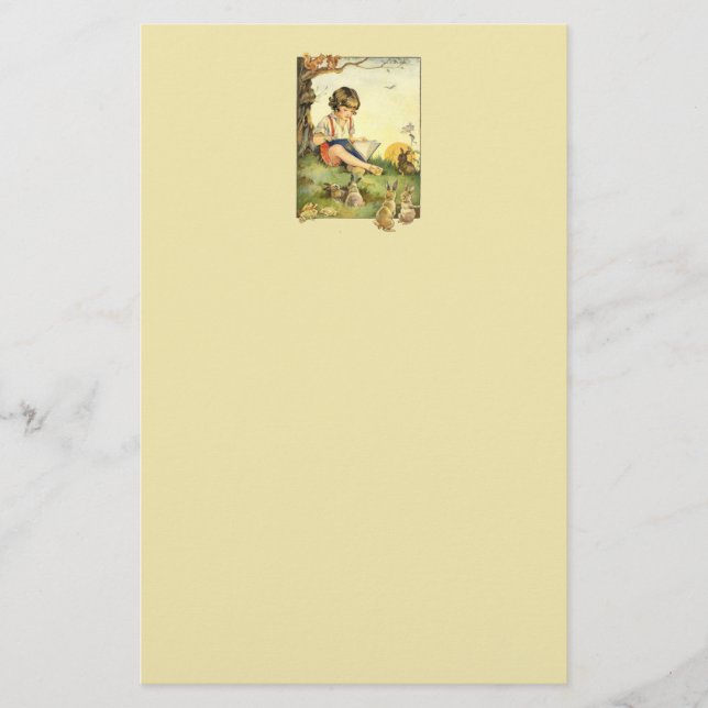 Boy reading under tree with rabbits stationery (Front)