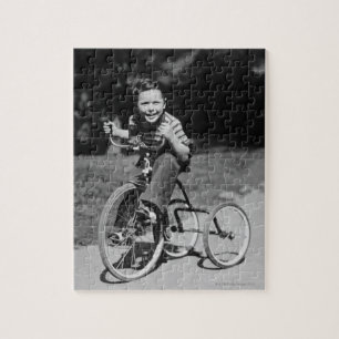 Boy Riding Tricycle Jigsaw Puzzle