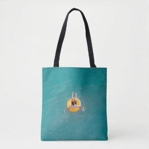 Boy sitting on buoy tote bag