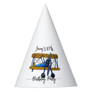 Boys birthday party with blue and yellow biplane hat