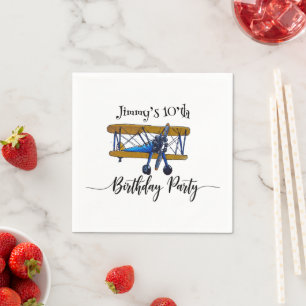 Boys birthday party with blue and yellow biplane napkin