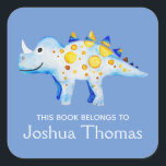 Boys Blue This Book Belongs Dinosaur and Name Kids Square Sticker<br><div class="desc">This beautiful boy's 'this book belongs' bookplate design features a watercolor blue and gold dinosaur,  and has place for you to add your kids name in lovely typography. Perfect for your child's back to school supplies. Check out the rest of our collection for other cute kids items.</div>