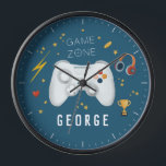 Boys Cool Video Game Controller Kids Gaming Clock<br><div class="desc">This cool blue custom kids and teens clock design features a blue cartoon video game design, with a controller, headset, game coins, health heart, lightening bolt, ‘game zone’, stars, and trophy. There is also space for you to add your boys name in a modern font. The perfect kids room decor...</div>