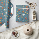Boys Modern Blue Sports Football Kids Birthday  Wrapping Paper<br><div class="desc">This cool and modern sports-themed kids birthday wrapping paper design features a blue sports pattern,  with a basketball,  football,  soccer ball,  tennis racket,  trophy,  and stars. The perfect sports-themed wrapping for your kids birthday.</div>