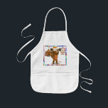 Brandon, circus strong-bear kids apron<br><div class="desc">Brandon may be big and brawny, but he’s also warm-hearted and determined. Proudly lifting enormous barbells above his head, he’s the circus’s beloved gentle giant. With a striped old-fashioned strongman suit and a soft smile, Brandon inspires everyone to discover their own inner strength. You can find lots of other Dingaling...</div>