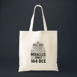 Brewing Miracles Since 164 BCE Hanukkah Jewish  Tote Bag<br><div class="desc">Hanukkah Miracle Meme,  Jewish History Humour,  Menorah Oil Miracle,  Festival Of Lights Quote,  Hanukkah 2025 Tradition,  Brewing Miracles,  Ancient Jewish Humour,  Cultural Heritage,  Holiday History,  Miracle Of Light</div>