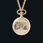 Bridal necklace watch-gold<br><div class="desc">Timeless elegance meets romantic charm with this Happily Ever After gold necklace watch. Featuring delicate champagne glasses tied with satin bows and framed by soft roses, this piece is both a graceful accessory and a meaningful keepsake. Perfect for brides, bridesmaids, or as a heartfelt gift, it adds a classic touch...</div>