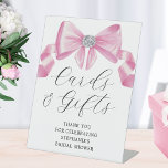 Bridal Shower Cards Gifts Pink Bow Glam Pedestal Sign<br><div class="desc">This bridal shower sign features a silky pink bow design with faux rhinestones and modern script typography. Personalise it with your text. Matching bridal shower products available.</div>