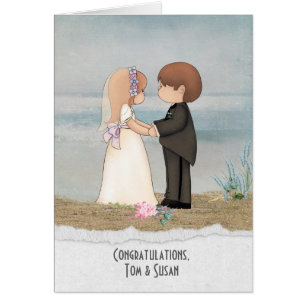 bride and groom on beach sand with specific name