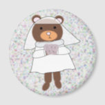 bride bear magnet<br><div class="desc">A brown bear dressed as a bride,  ready for her wedding,  holds a bouquet of pink flowers against a multi coloured purple background on a magnet</div>