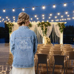 Bride Floral Heart Monogrammed Denim Jacket<br><div class="desc">Create a beautiful bridal accessory with this monogrammed template denim jacket with an elegant, blue, floral, heart. The heart colours can be changed to suit your wedding theme, as well as the text colours. *For a DIY, elegant look, you can add stunning pearl beads or bejewel it however you like....</div>