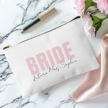 Bride Makeup Bag | Personalised Future Mrs. Name<br><div class="desc">Keep bridal beauty essentials organised with this stylish personalised bride makeup bag, featuring bold blush pink “BRIDE” text and customisable “future Mrs. [Your Name]” in elegant script. This accessory pouch is perfect for storing makeup, toiletries, or emergency wedding-day essentials—ideal for bridal showers, bachelorette gift bags, or honeymoon travel. Why brides...</div>