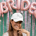 Bride Personalised Bachelorette Party Cap<br><div class="desc">Celebrate the bride-to-be with this chic and fun personalised trucker hat — the perfect accessory for bachelorette parties, beach getaways, and wedding prep! Featuring a modern script "Bride" with heart detail and a customisable name, this lightweight and breatheable cap keeps her stylish and sun-safe. Available in a variety of colours...</div>