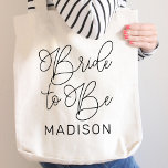 Bride to Be Black Modern Script Custom Wedding Tote Bag<br><div class="desc">Modern and casual chic black calligraphy script "Bride to Be" women's bridal wedding tote bag features custom text that can be personalised with the bride's first name. Perfect accessory for the bachelorette party and the wedding weekend!</div>
