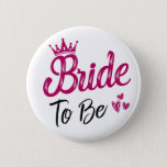 "Bride to be" white with pink crown and black text 6 Cm Round Badge<br><div class="desc">On this "Bride to be" button,  the word Bride is printed in pink with a crown over the first letter. The words "to be" are printed in black,  with three little pink hearts next to them</div>