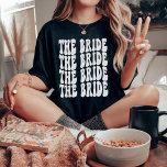 Bride White Customised Matching Bridal Party T-Shirt<br><div class="desc">Are you looking for a unique and fun way to celebrate your bachelorette party? Why not go with a personalised t-shirt theme? With our retro The Bride personalised white lettering t-shirt, you can have all of your bridal party matched up in style! Not only will this shirt be a great...</div>