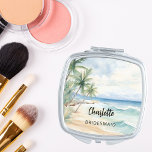 Bridesmaid beach wedding compact mirror<br><div class="desc">A tropical beach,  waves and palm trees,  watercolored.  Personalise and add your bridesmaid's name.   Black handwritten style script.</div>