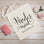Bridesmaid Black Script Personalised Wedding Tote Bag<br><div class="desc">Wedding Bridesmaid tote bag features modern black swirling calligraphy script writing with elegant custom first name text that you can personalise. See our coordinating bridal party designs!</div>