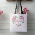 Bridesmaid Floral Personalized Name Tote Bag<br><div class="desc">Soft pink watercolor flowers form a delicate wreath around the word “Bridesmaid, ” creating a light and romantic look for bridal party gifts. Personalize the bag with a name to make each one special for the wedding celebration or bachelorette party.</div>