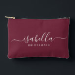 Bridesmaid Gift Burgundy Accessory Pouch<br><div class="desc">This Bridesmaid accessory bag features a handwritten white script typography with swashes on a burgundy background. Present your bridesmaids with a toiletry bag for their makeup and small items traditionally presented at the rehearsal dinner,  for use in the early morning before the wedding.</div>