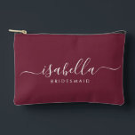 Bridesmaid Gift Burgundy Accessory Pouch<br><div class="desc">This Bridesmaid accessory bag features a handwritten white script typography with swashes on a burgundy background. Present your bridesmaids with a toiletry bag for their makeup and small items traditionally presented at the rehearsal dinner,  for use in the early morning before the wedding.</div>