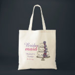 Bridesmaid Gift Pink Purple Floral Wedding Cake Tote Bag<br><div class="desc">Canvas tote bag features an original marker illustration of a tiered wedding cake with purple and pink icing flowers and BRIDESMAID in a fun font. A unique bridal party gift! This design is also available on other products. Don't see what you're looking for? Need help with customization? Contact Rebecca to...</div>