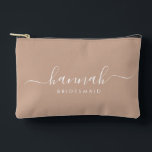 Bridesmaid Modern Minimal Script Cosmetic  Accessory Pouch<br><div class="desc">This Bridesmaid accessory bag features a handwritten white script typography with swashes on a tan background. Present your bridesmaids with a toiletry bag for their makeup and small items traditionally presented at the rehearsal dinner,  for use in the early morning before the wedding.</div>