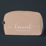 Bridesmaid Modern Minimal Script Cosmetic  Dopp Kit<br><div class="desc">This Bridesmaid accessory bag features a handwritten white script typography with swashes on a tan background. Present your bridesmaids with a toiletry bag for their makeup and small items traditionally presented at the rehearsal dinner,  for use in the early morning before the wedding.</div>