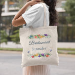 Bridesmaid Personalized Floral Beach Wedding Tote Bag<br><div class="desc">This lovely floral beachy tote bag is perfect for special gifts for your bridesmaids. Shimmery watercolor roses and greenery are accented with starfish,  pearls,  and glitter.  Easily change the text to personalize the design.</div>