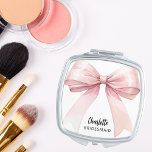 Bridesmaid pink bow elegant compact mirror<br><div class="desc">A pink bow,  white background.  Personalise and add your bridesmaid's name.   Black handwritten style script.</div>