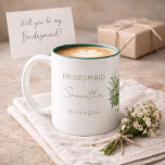 Bridesmaid Wedding Eucalyptus Green Name and Date Two-Tone Coffee Mug<br><div class="desc">Looking for a meaningful bridesmaid gift that feels elegant and personal? This custom eucalyptus green mug with name and wedding date is a keepsake she’ll treasure long after the big day. Ideal for bridesmaid proposals, bridal showers, and wedding morning gifts. Features a modern eucalyptus green bouquet design with custom name...</div>