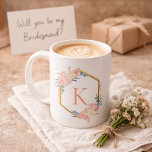 Bridesmaid Wedding Pastel Floral Wreath Monogram Coffee Mug<br><div class="desc">This monogram pastel floral wreath bridesmaid coffee mug is a keepsake she’ll use long after the wedding day. Ideal for bridesmaid proposals, bridal showers, and wedding morning gifts. Features a soft pastel floral wreath with a custom monogram. Personalize it with her initial for a one-of-a-kind touch and then instantly preview...</div>