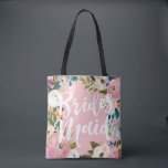 Bridesmaids Brushed Floral Wedding Party Pink Tote Bag<br><div class="desc">Custom colour background and all over printing with painted floral edges. Bridesmaid in brush script on one side and name on the back. Customise to change the background colour (pink). Black looks amazing too. The gorgeous painted florals are by Create the Cut. Find them on Creative Market https://crmrkt.com/7WdAX, Etsy https://www.etsy.com/shop/CreateTheCut,...</div>
